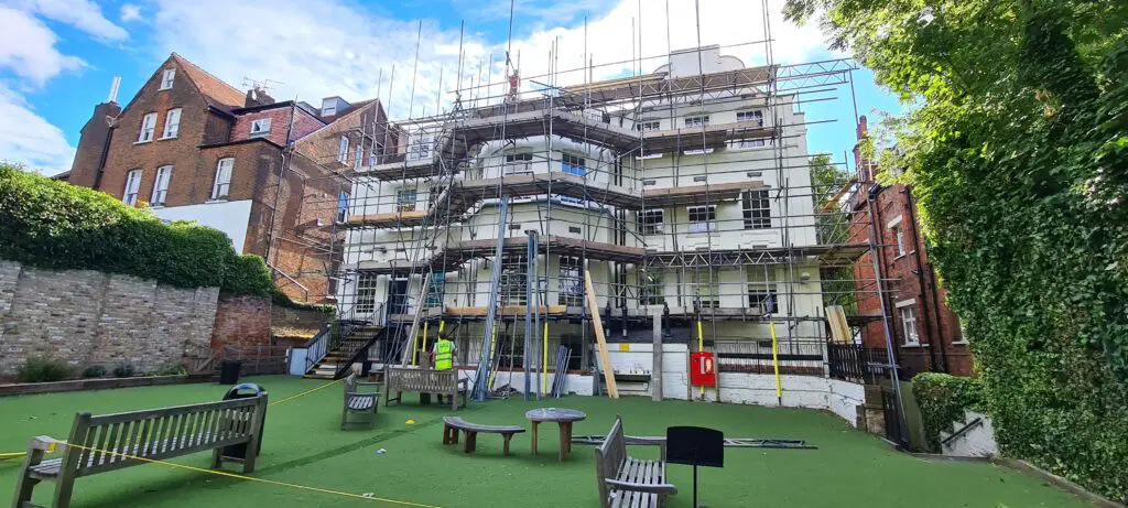 The exterior refurbishment of South Hampstead School, with scaffolding to aid work.